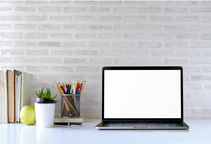 Image of a laptop computer on a desk - Online Mental Health Therapy