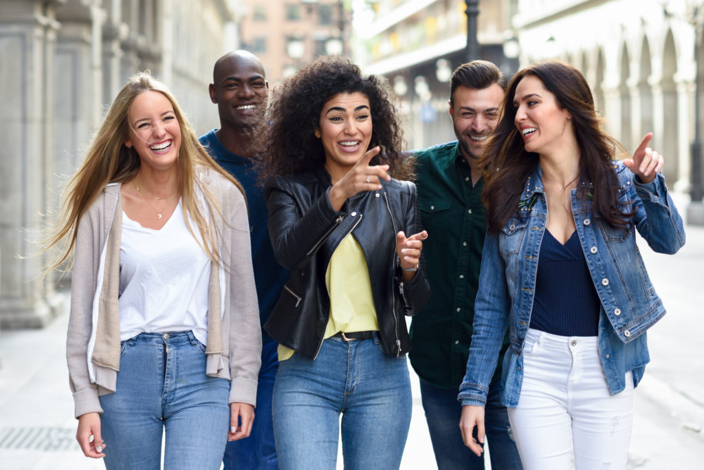 Group of friends having fun together laughing